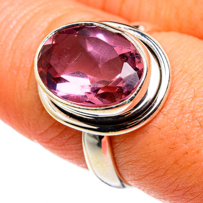 Sterling silver alexandrite-style ring with oval faceted pink gem, close-up