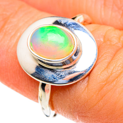 Sterling silver opal ring, round green opal with rainbow flash on textured bezel