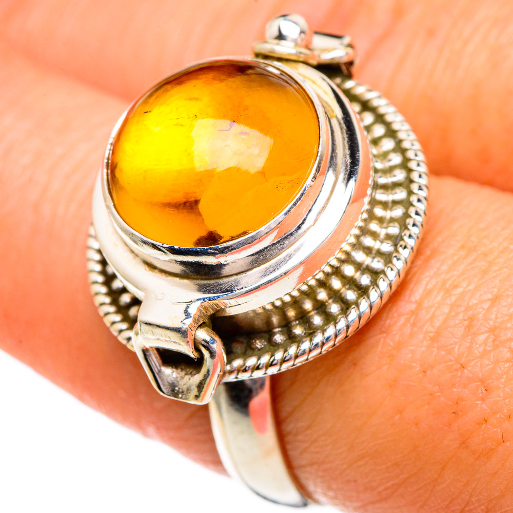 Sterling silver ring with oval amber citrine stone, split prongs and beaded edge