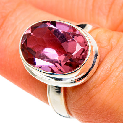 Sterling silver ring with oval alexandrite-style gemstone, purple-red facets
