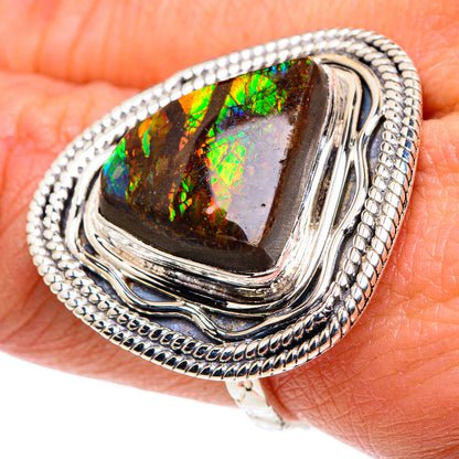 Sterling silver ring with ammolite gemstone, green/orange iridescence, ornate bezel