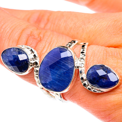 Sterling silver ring with large oval blue center stone and two oval side stones