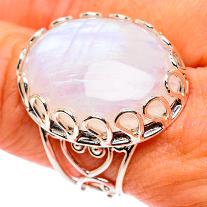 Sterling silver ring with oval opalescent moonstone and scalloped metal bezel