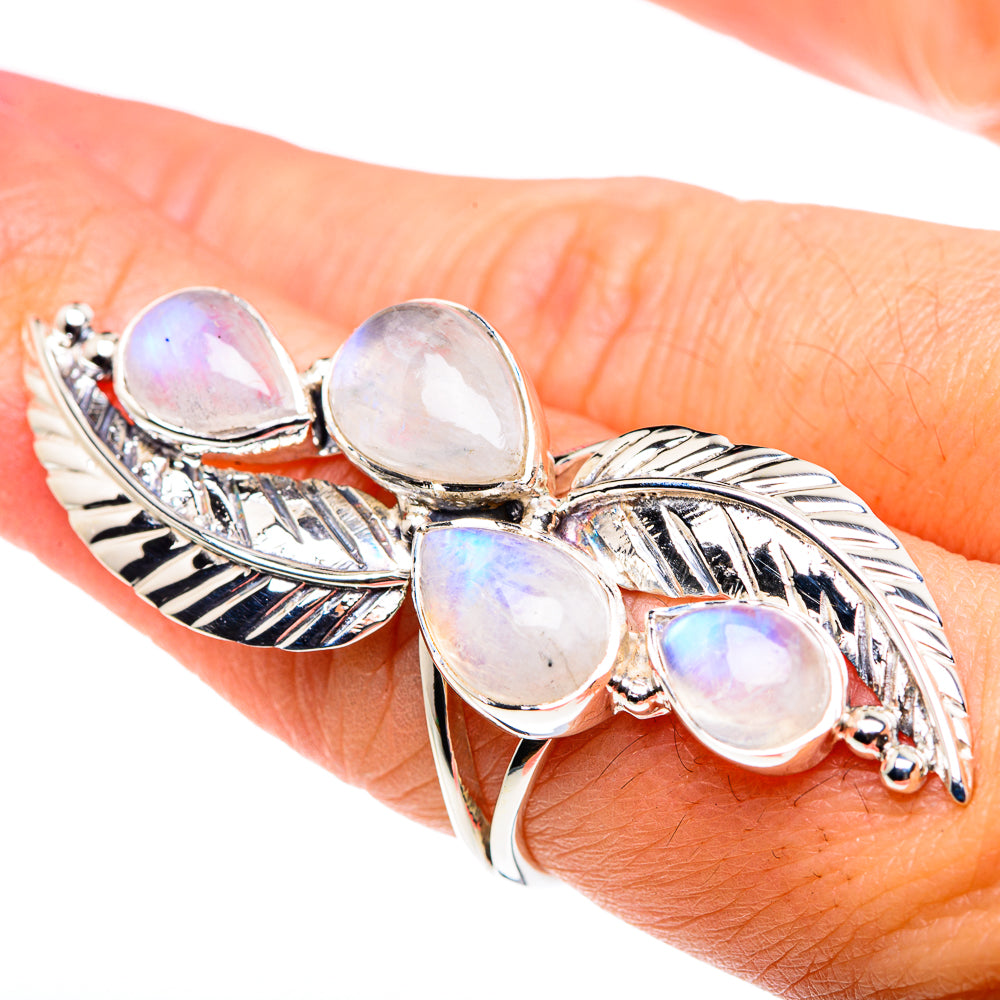 Sterling silver moonstone ring with five pear-shaped opalescent stones on leaf band