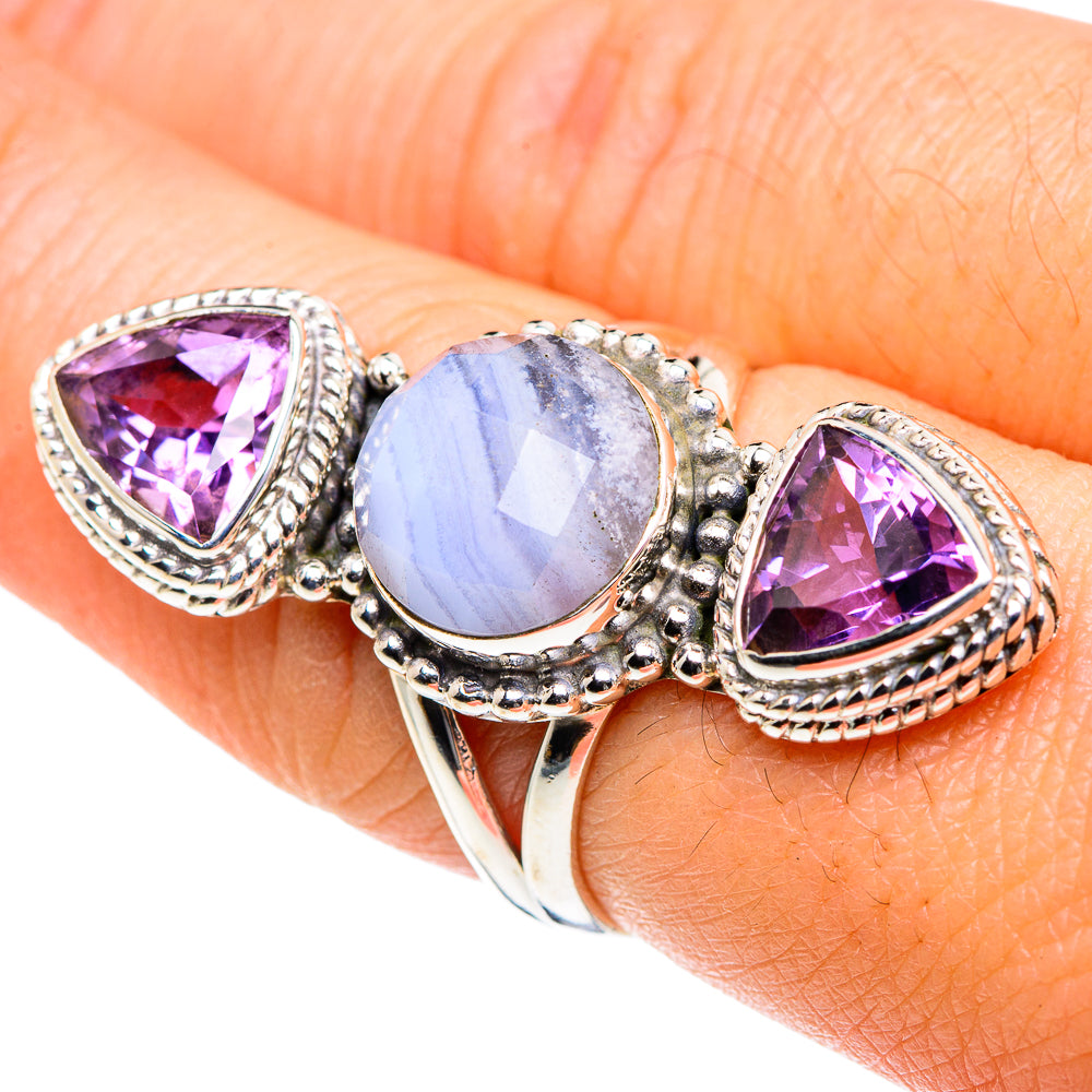 Sterling silver ring with oval blue and two purple teardrop stones, ornate bezels