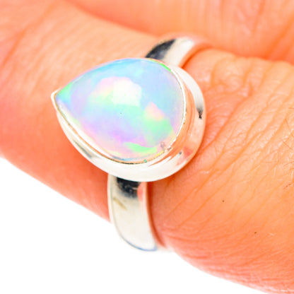 925 sterling silver opal ring with oval iridescent stone, open bezel setting
