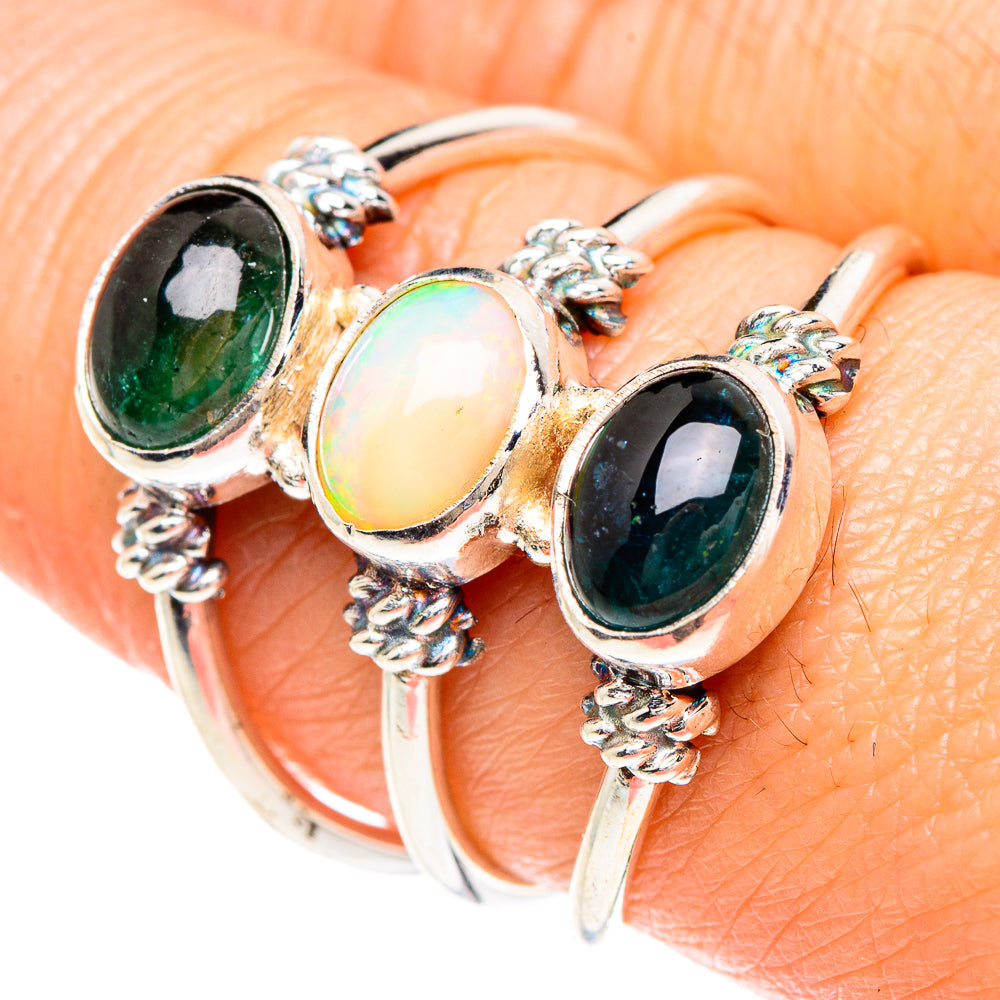 925 sterling silver three-stone ring with oval dark green and iridescent opal stones