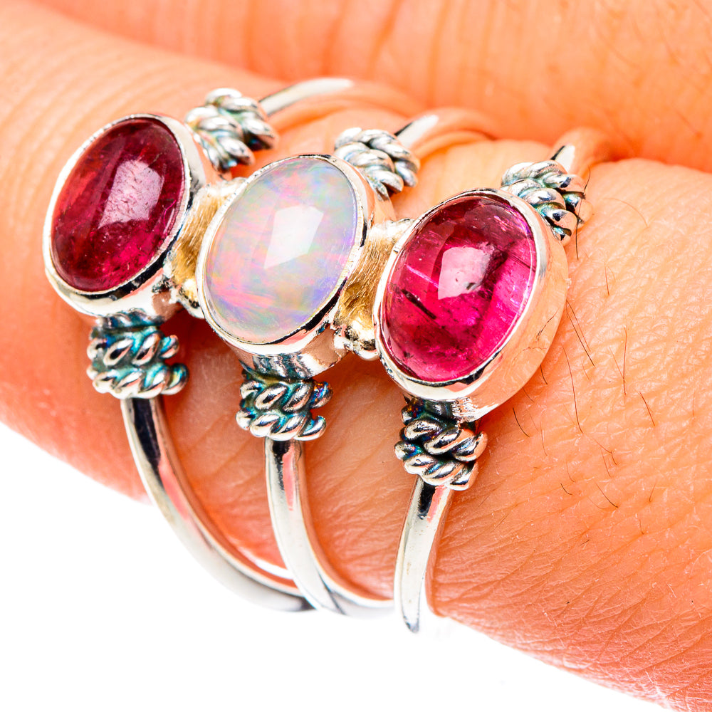Sterling silver ring with oval pink tourmaline and oval opal center stone, size 8