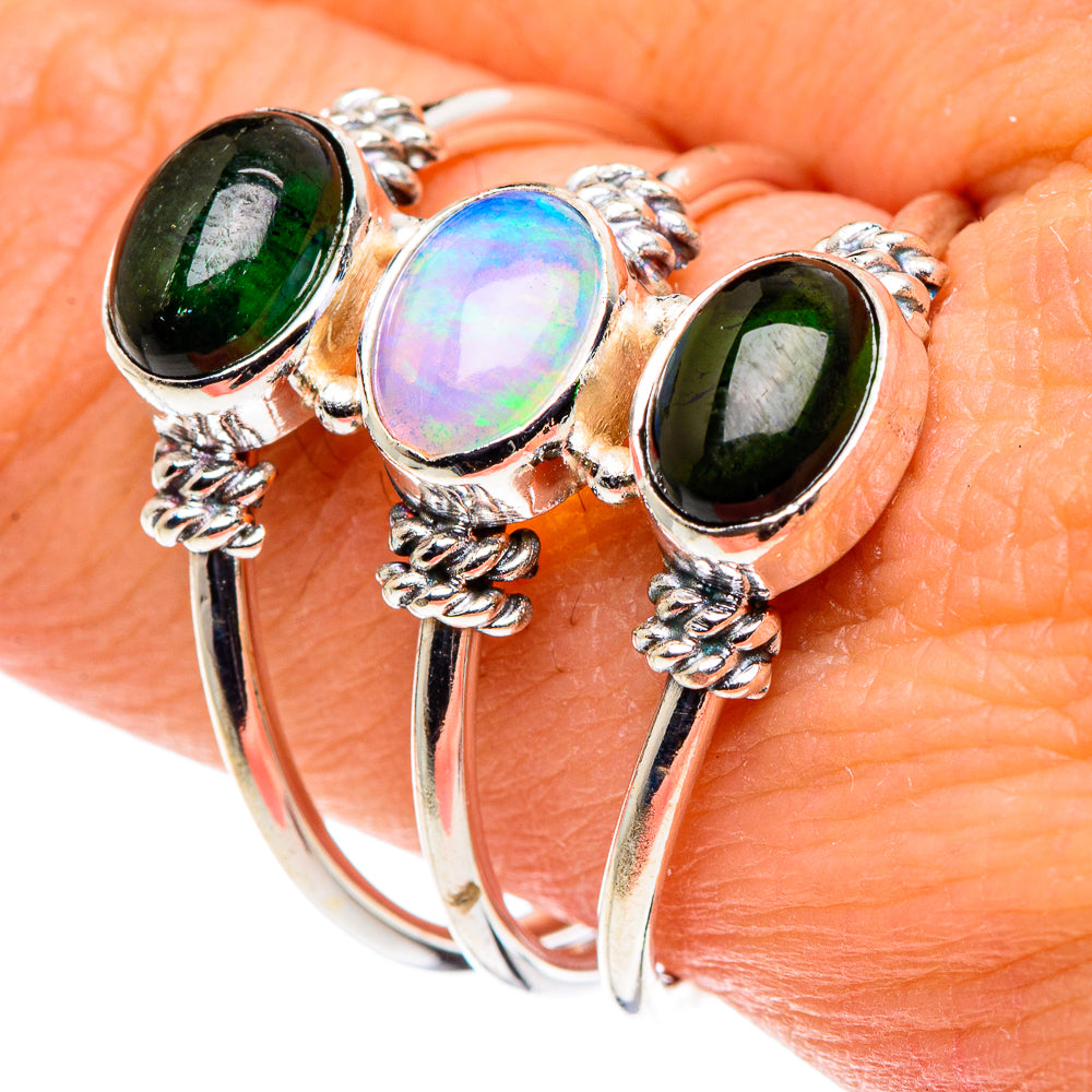 925 sterling silver ring with oval opal and two green tourmalines, rope-like settings