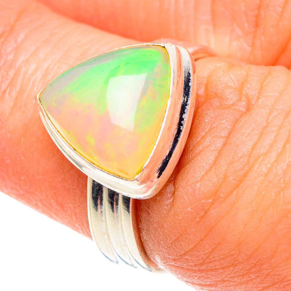 Sterling silver opal ring with teardrop cabochon, green-yellow-orange iridescence