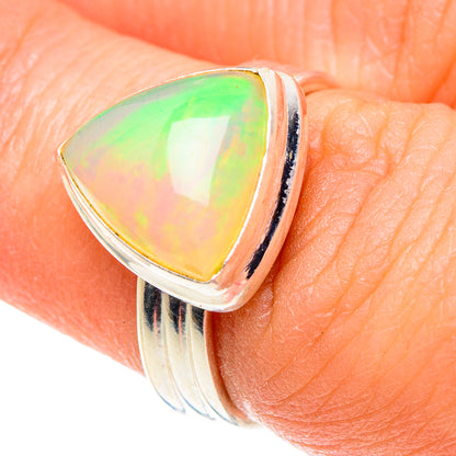 Sterling silver opal ring with teardrop cabochon, green-yellow-orange iridescence