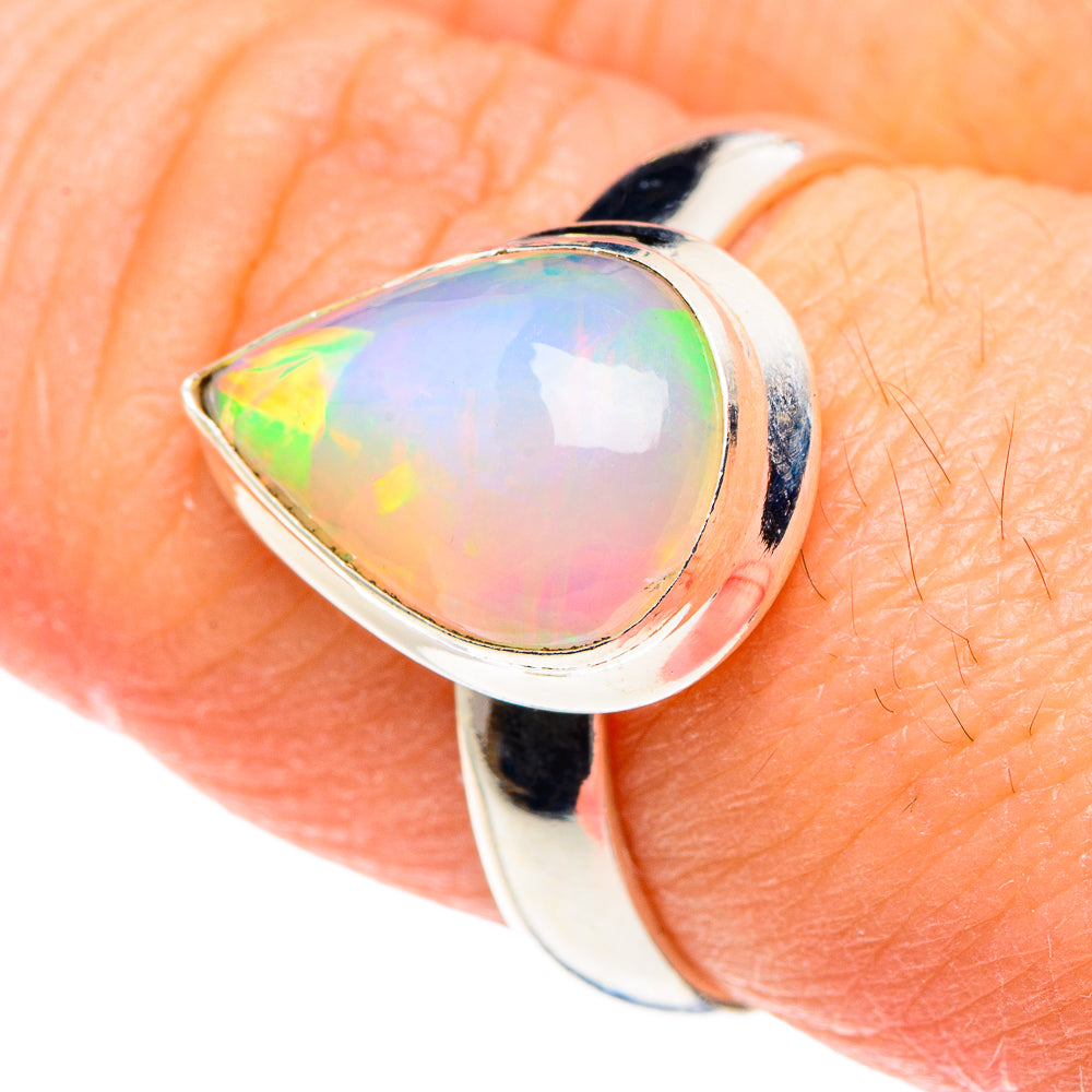 Teardrop opal ring in 925 sterling silver, prong-set on finger