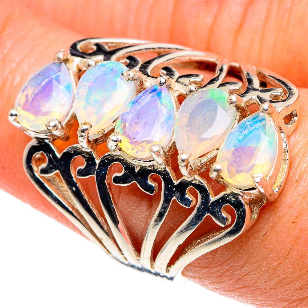 Sterling silver opal ring with oval opal stones and black enamel filigree