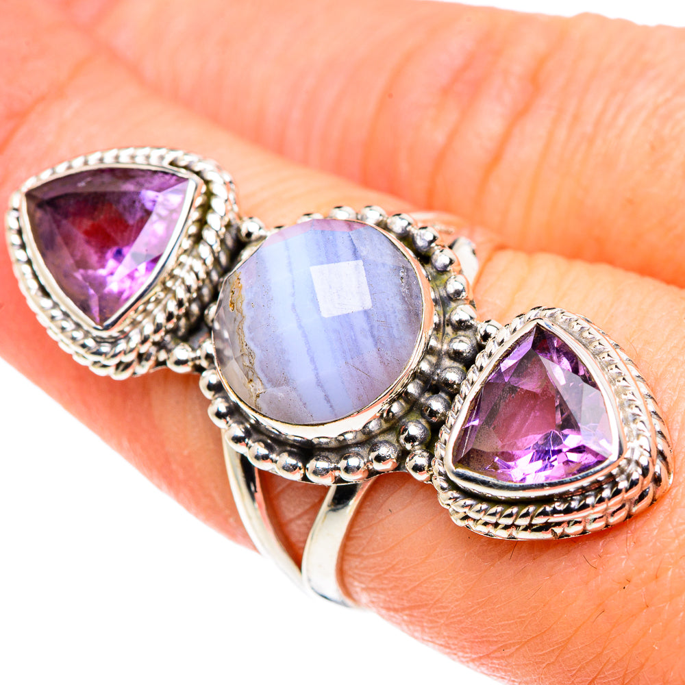 Sterling silver ring with oval blue agate center and two purple amethyst stones