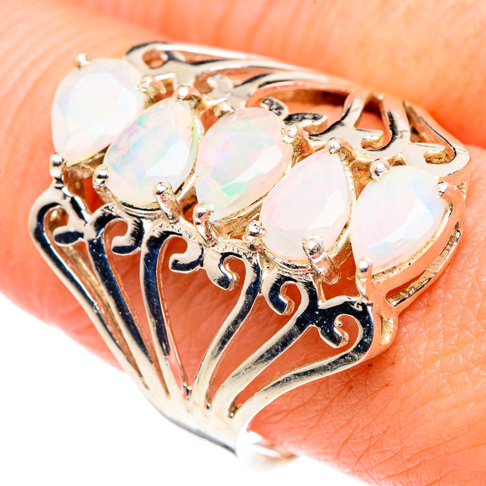Sterling silver opal ring with oval opal stones, filigree gallery and dark enamel scrollwork