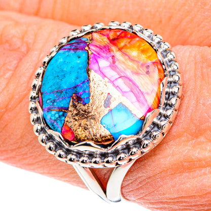 Silver-tone oval cabochon ring with turquoise, pink, orange and gold matrix stone