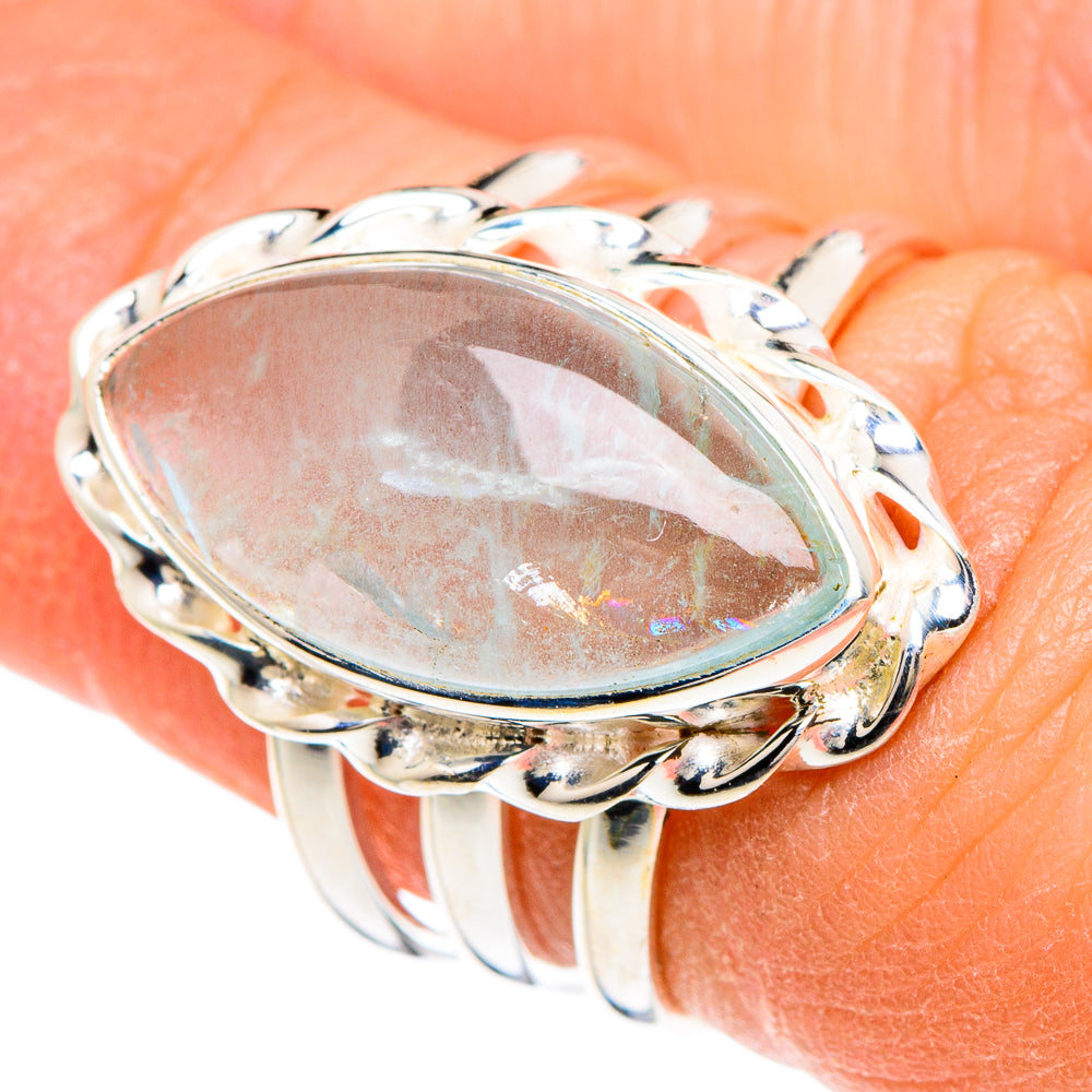 Oval aquamarine sterling silver ring with raised bezel and curved gallery, size 6