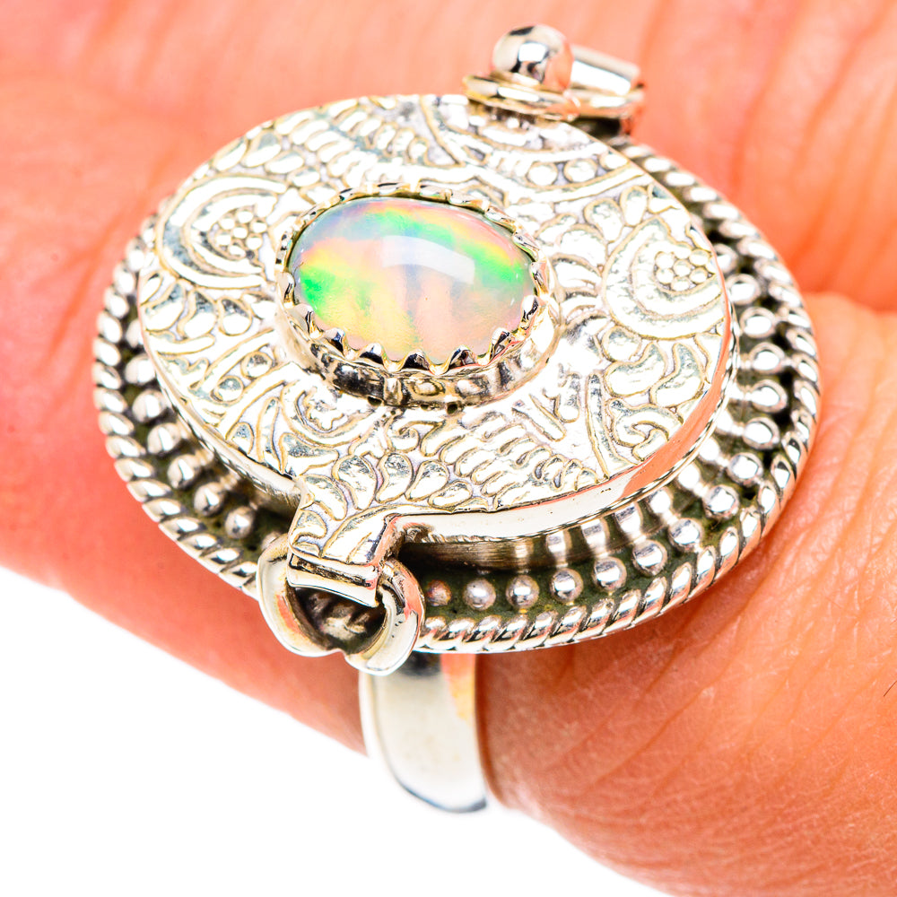 Textured 925 sterling silver ring with oval opal cabochon and engraved swirl details