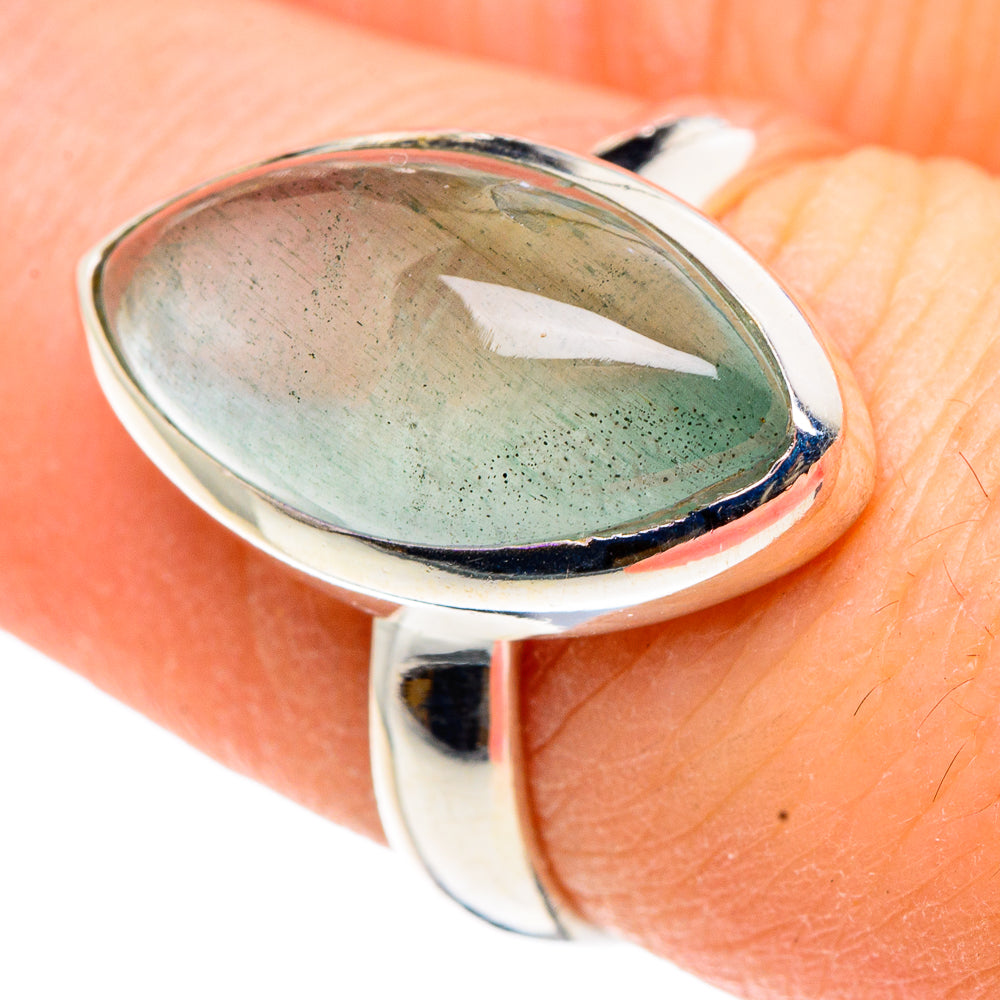 Sterling silver aquamarine ring, size 7, close-up of oval bezel setting and band