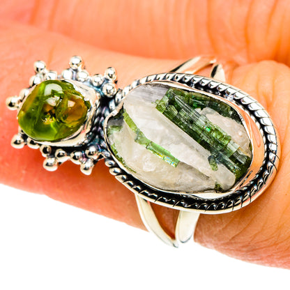 Green round gemstone and oval quartz in sterling silver ring with ornate side settings
