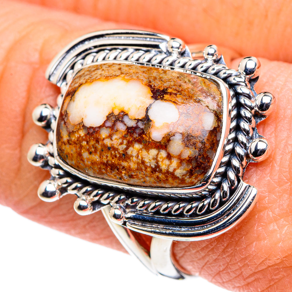 Sterling silver oval jasper ring with ornate prong bezel and brown cream stone detail