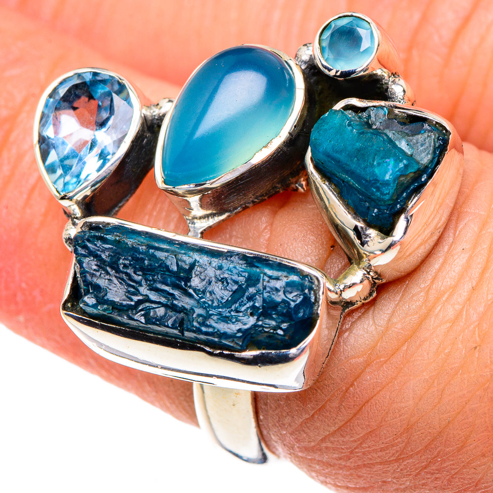 Sterling silver blue gemstone ring with oval aqua stone, round blue stone, and rough blue accents