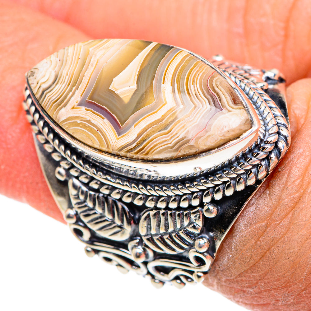 Sterling silver ring with oval lace agate center on ornate lattice band