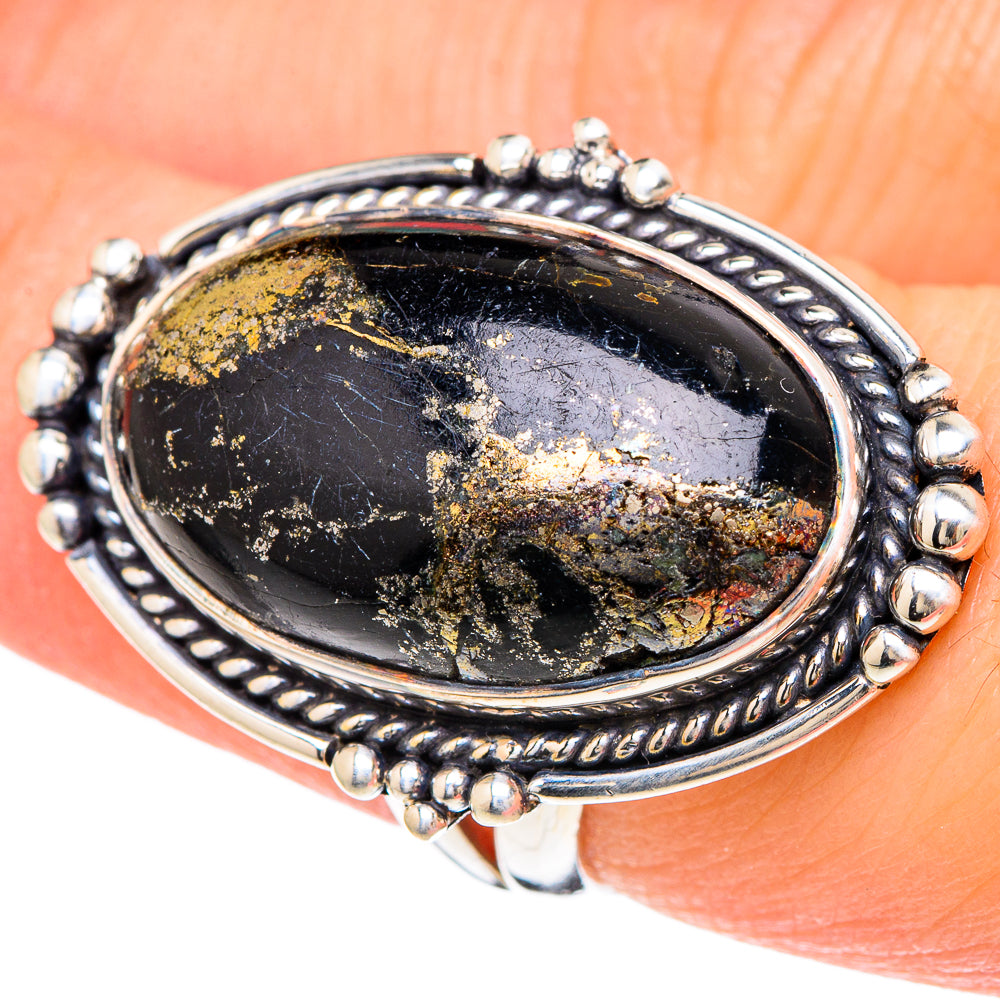 Oval dark onyx ring in sterling silver bezel with gold pyrite pattern, size 6.75