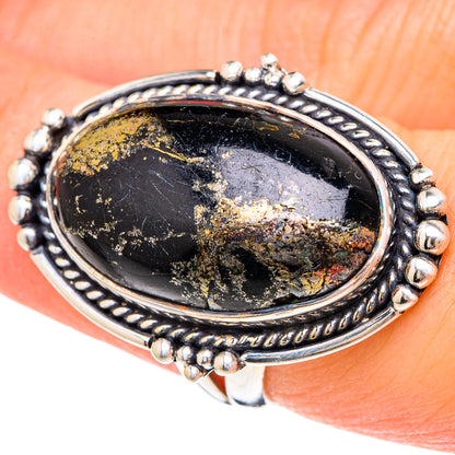 Oval dark onyx ring in sterling silver bezel with gold pyrite pattern, size 6.75