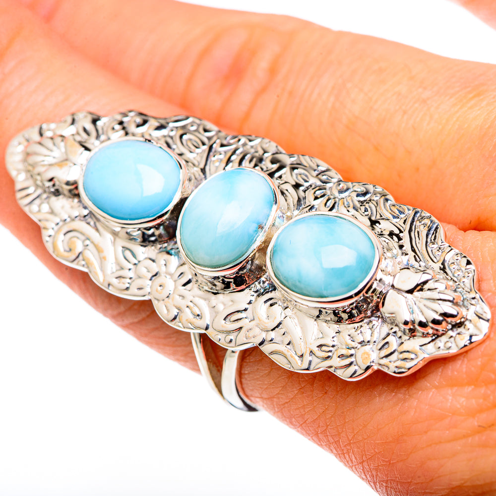 Sterling silver filigree ring with three light blue oval cabochon stones