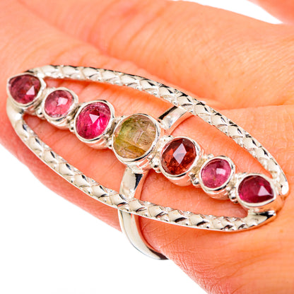 Pink tourmaline ring with oval prong setting on textured sterling silver band, size 9