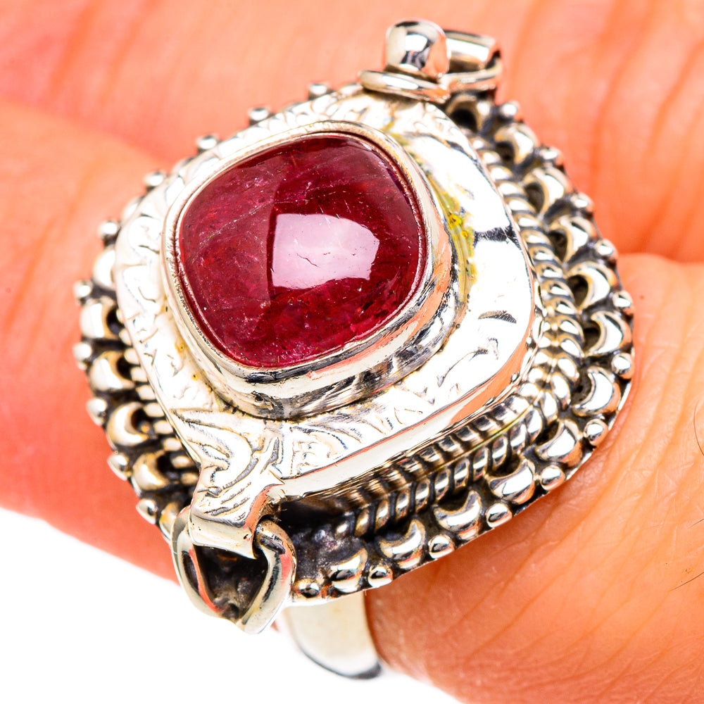 Sterling silver ring with oval pink tourmaline cabochon and ornate braided bezel