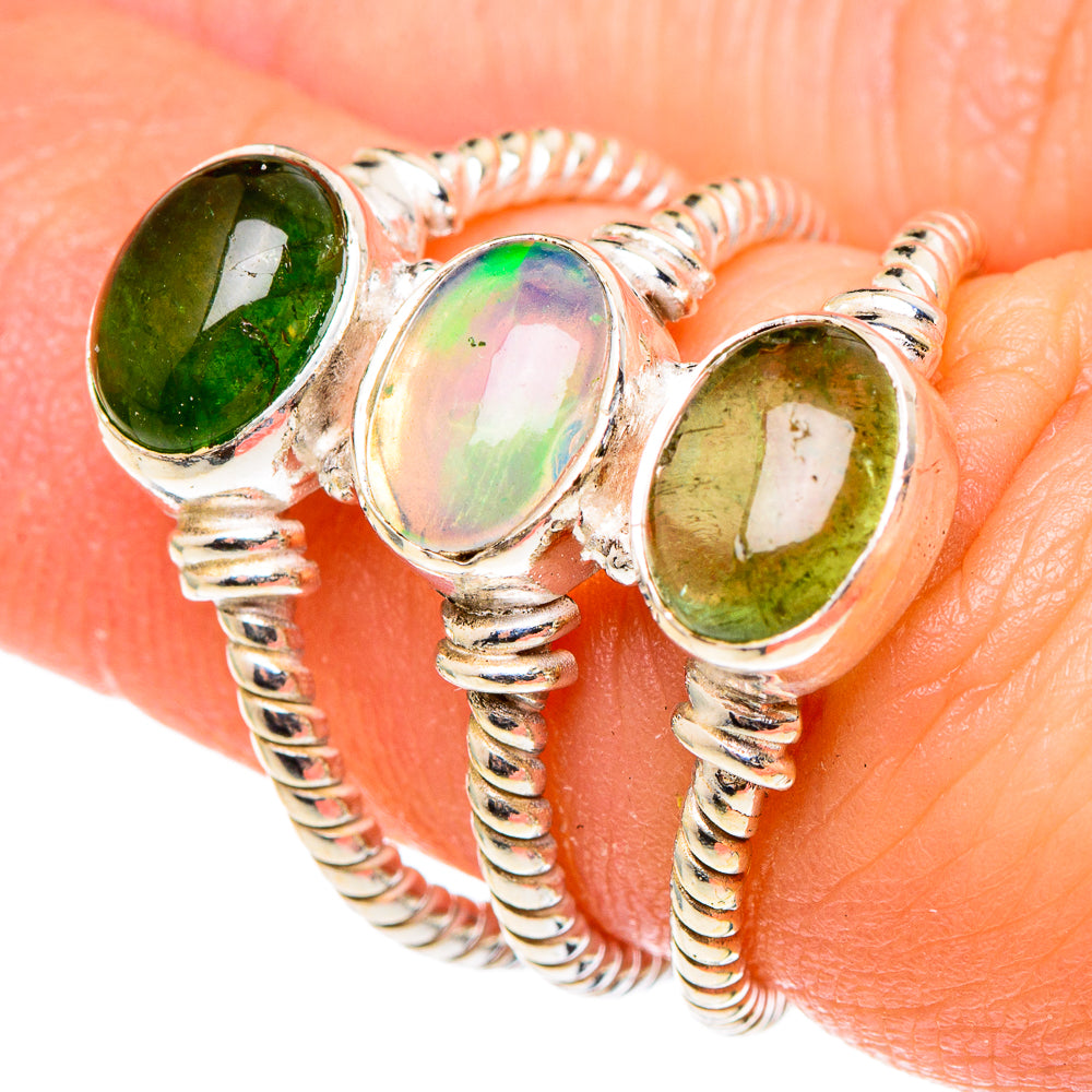 925 sterling silver triple oval gemstone ring with green side stones and iridescent middle.