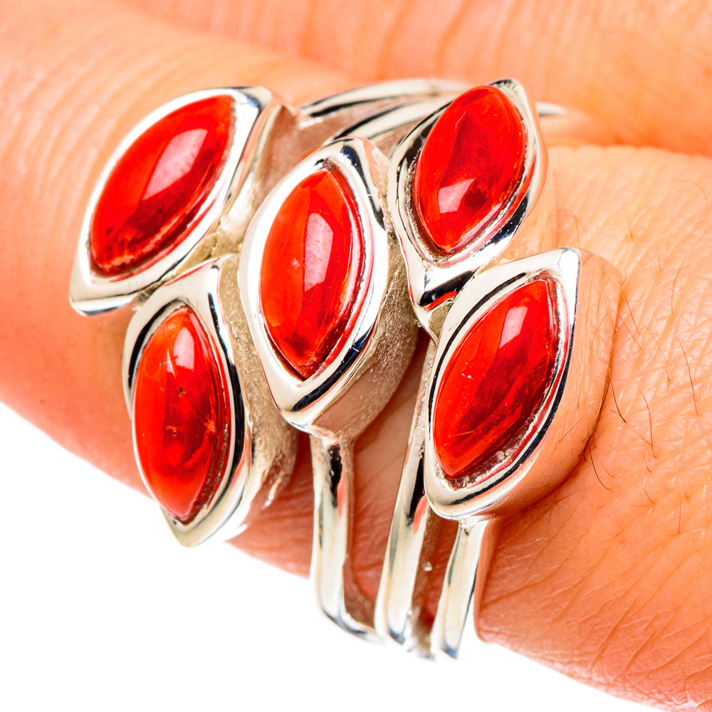 Red coral marquise bezel ring on silver band, 5 red stones