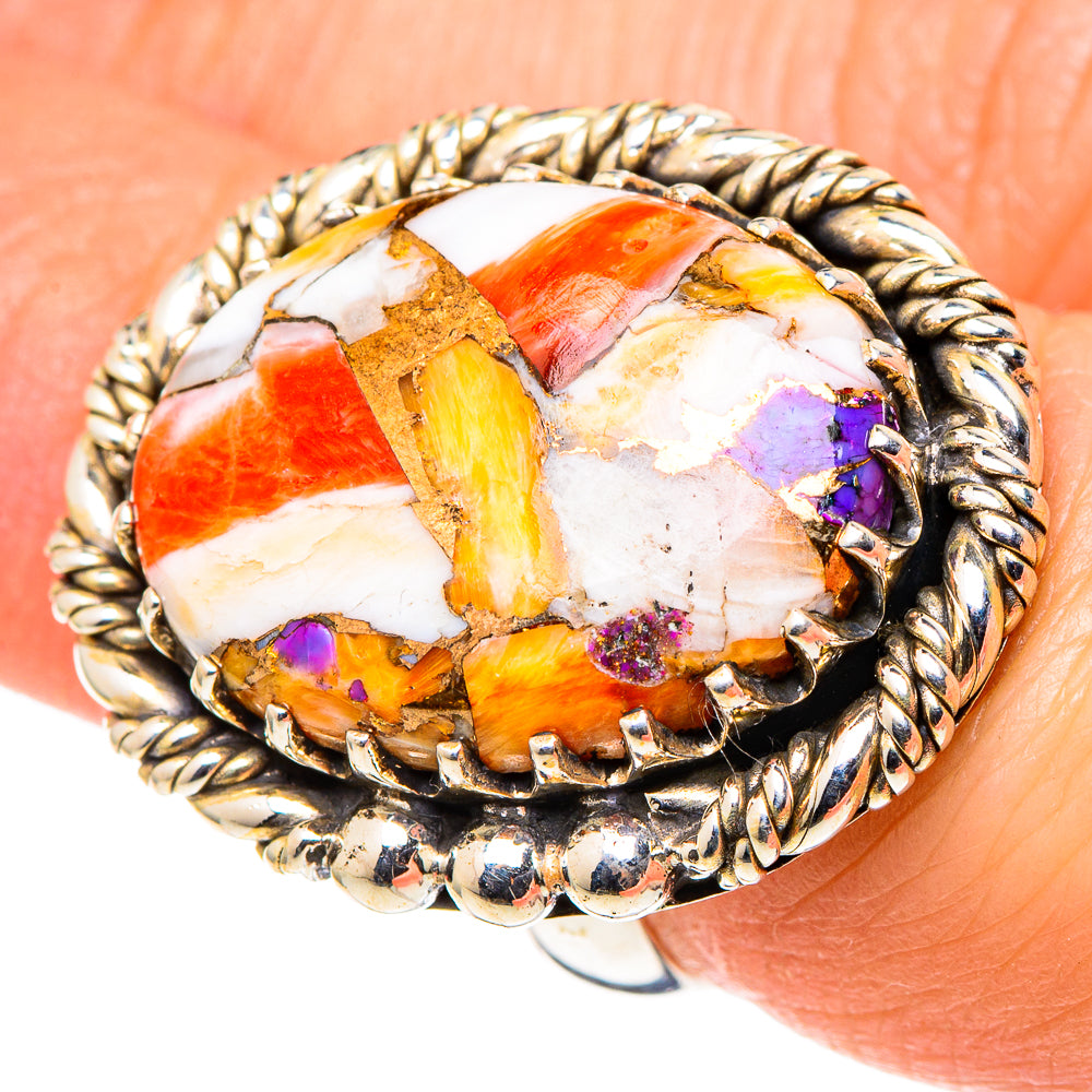 Oval mosaic stone ring with orange/red/purple inlay and twisted rope silver band