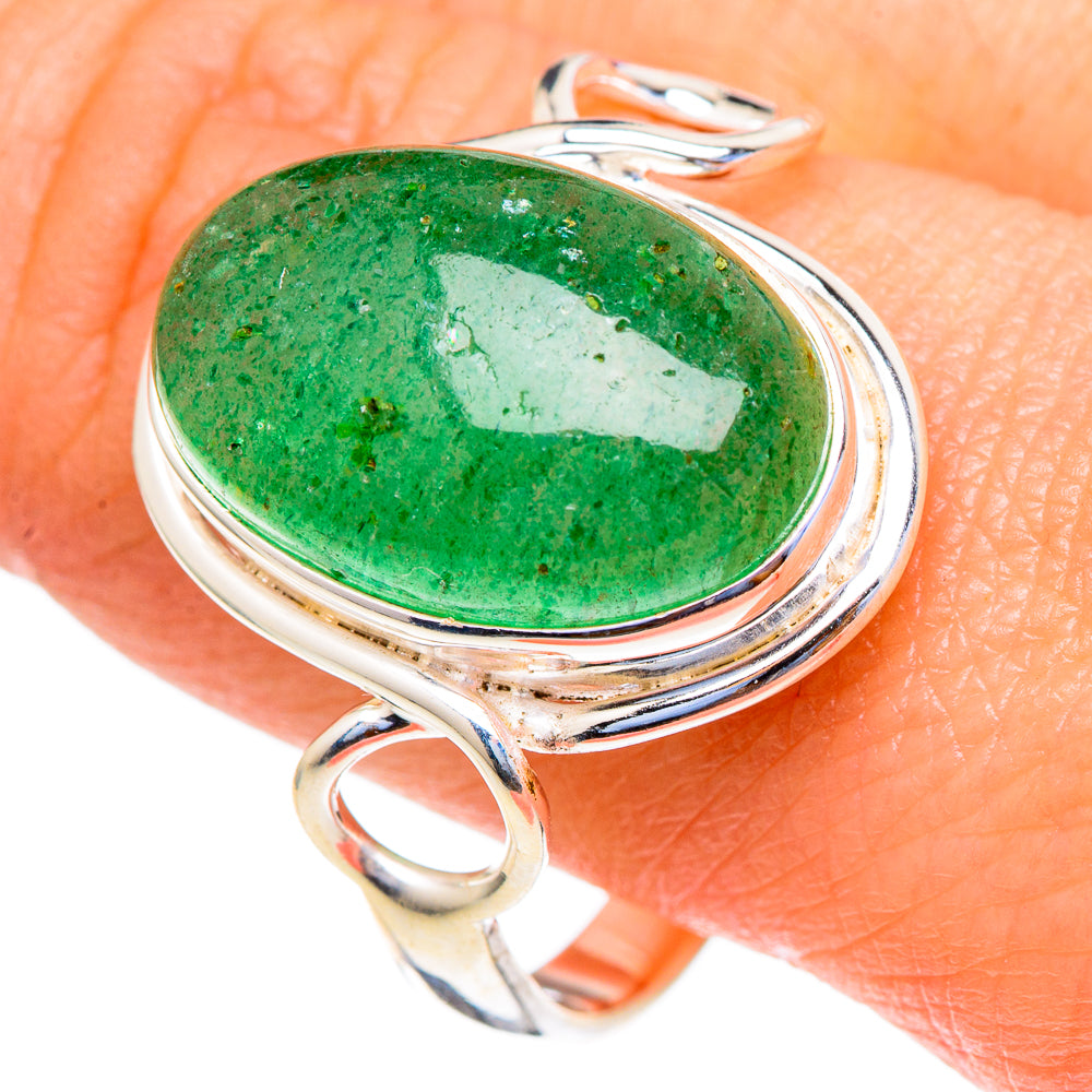 Green oval aventurine ring on finger, 925 sterling silver with split band and prong setting