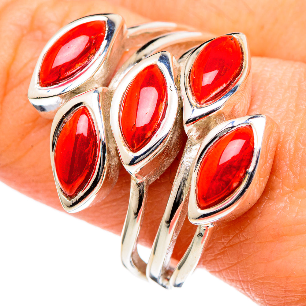 Sterling silver coral ring with red oval stones and curved side profile