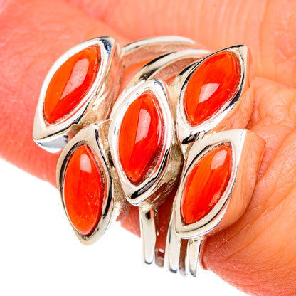 Sterling silver coral ring close-up with five marquise orange stones on bezels