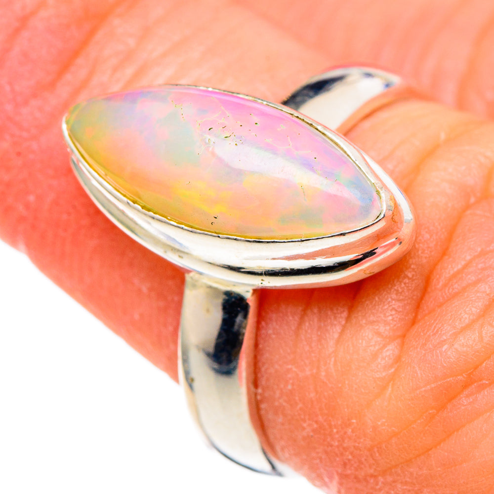 Sterling silver opal ring with oval iridescent gemstone, size 6.25