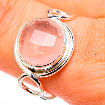 Rose quartz oval ring, polished sterling silver with split swirl band