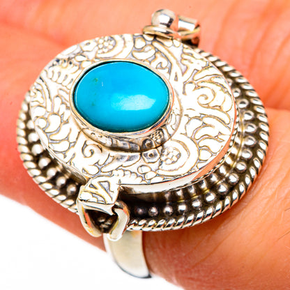 Sterling silver filigree ring with oval turquoise blue cabochon and ornate beaded edge