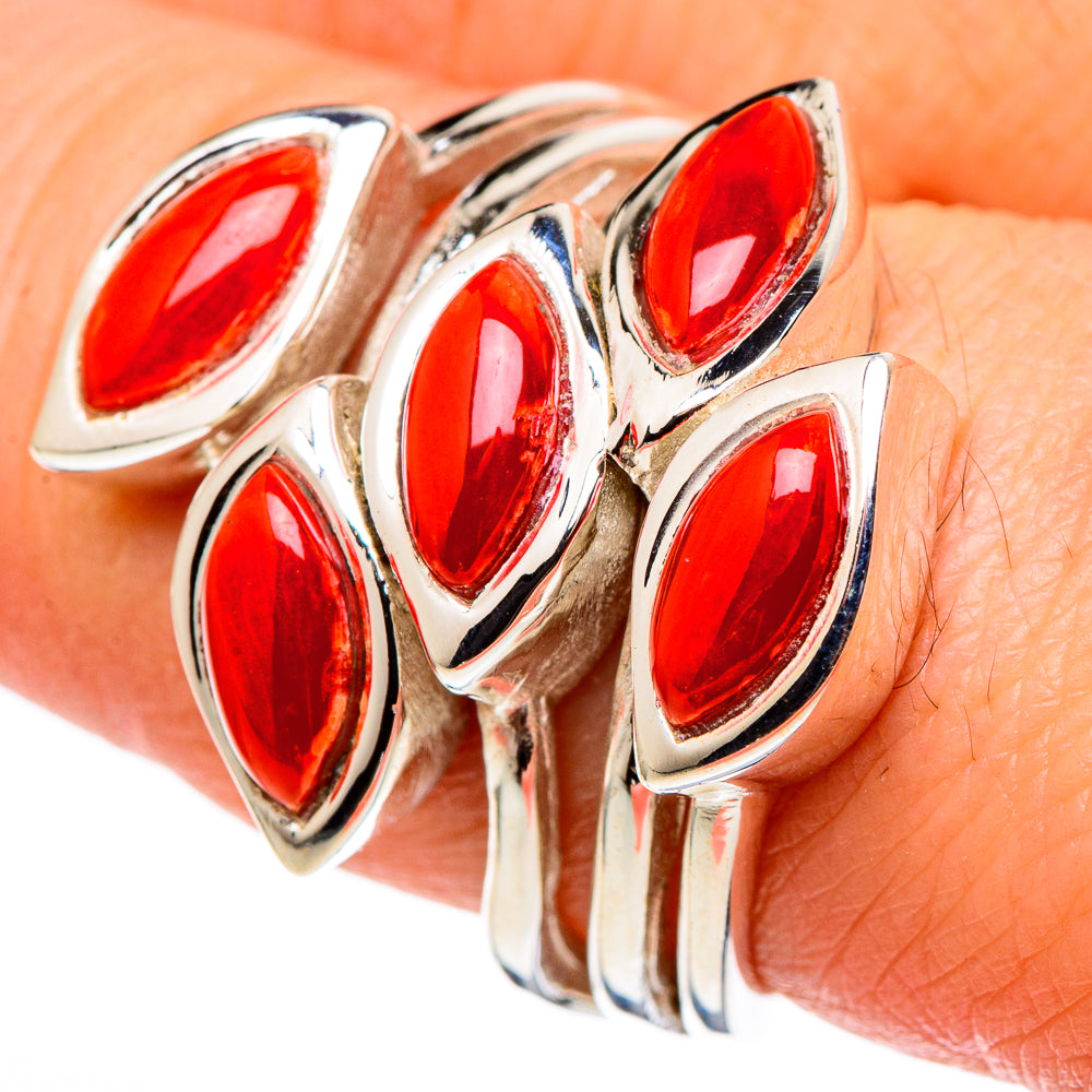 Sterling silver ring with five oval red coral cabochons in bezel settings