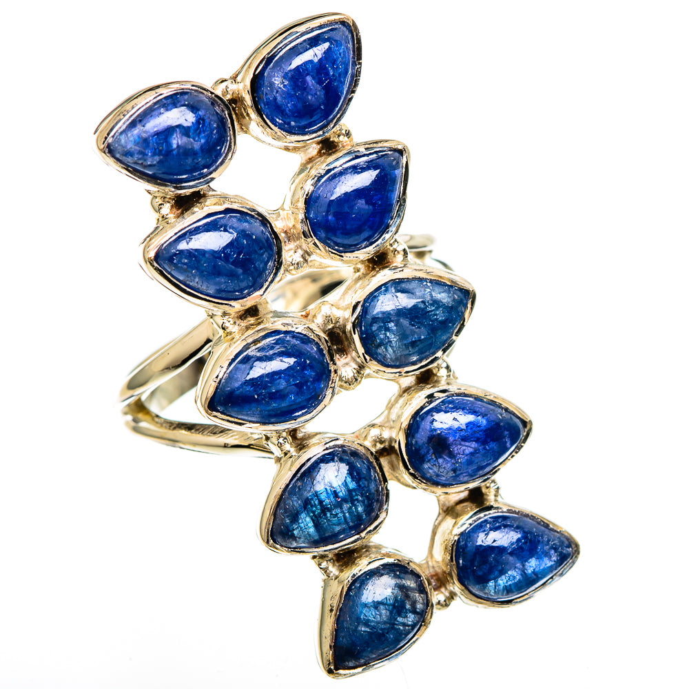 Gold-toned gemstone ring with marquise blue stones and an open, stacked band