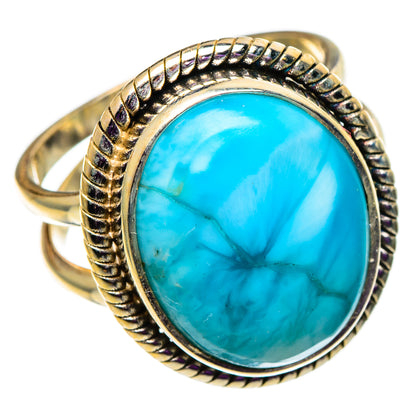 Turquoise oval gemstone ring with rope-detail silver bezel