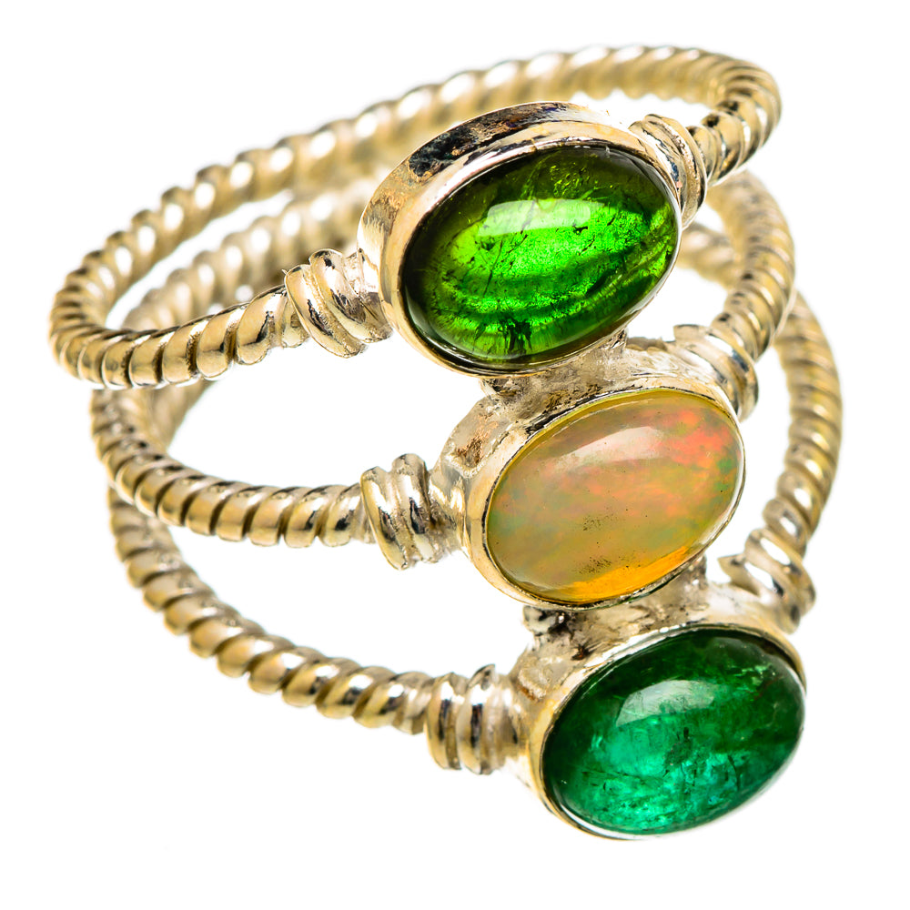Sterling silver ring with oval Ethiopian opal and two green tourmaline stones