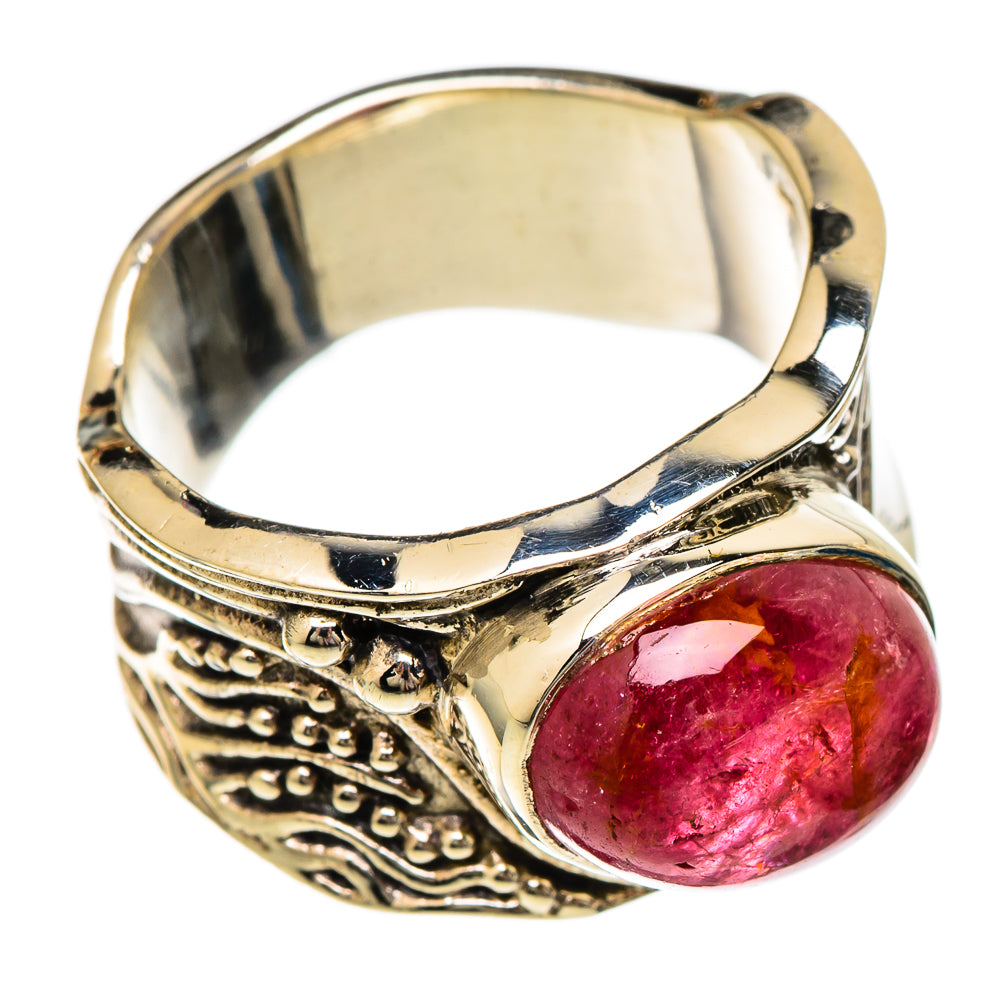 Silver-tone ring with oval pink tourmaline cabochon and ornate side details