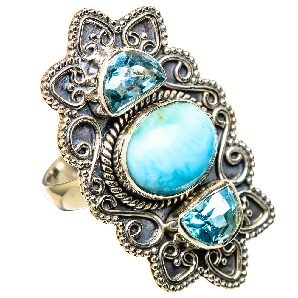 Sterling silver ornate ring with oval larimar and blue topaz teardrop accents
