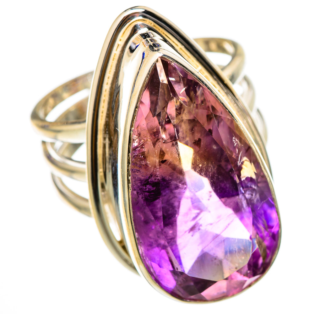 Two-tone metal ring with large oval faceted ametrine gemstone, prismatic purple and pink