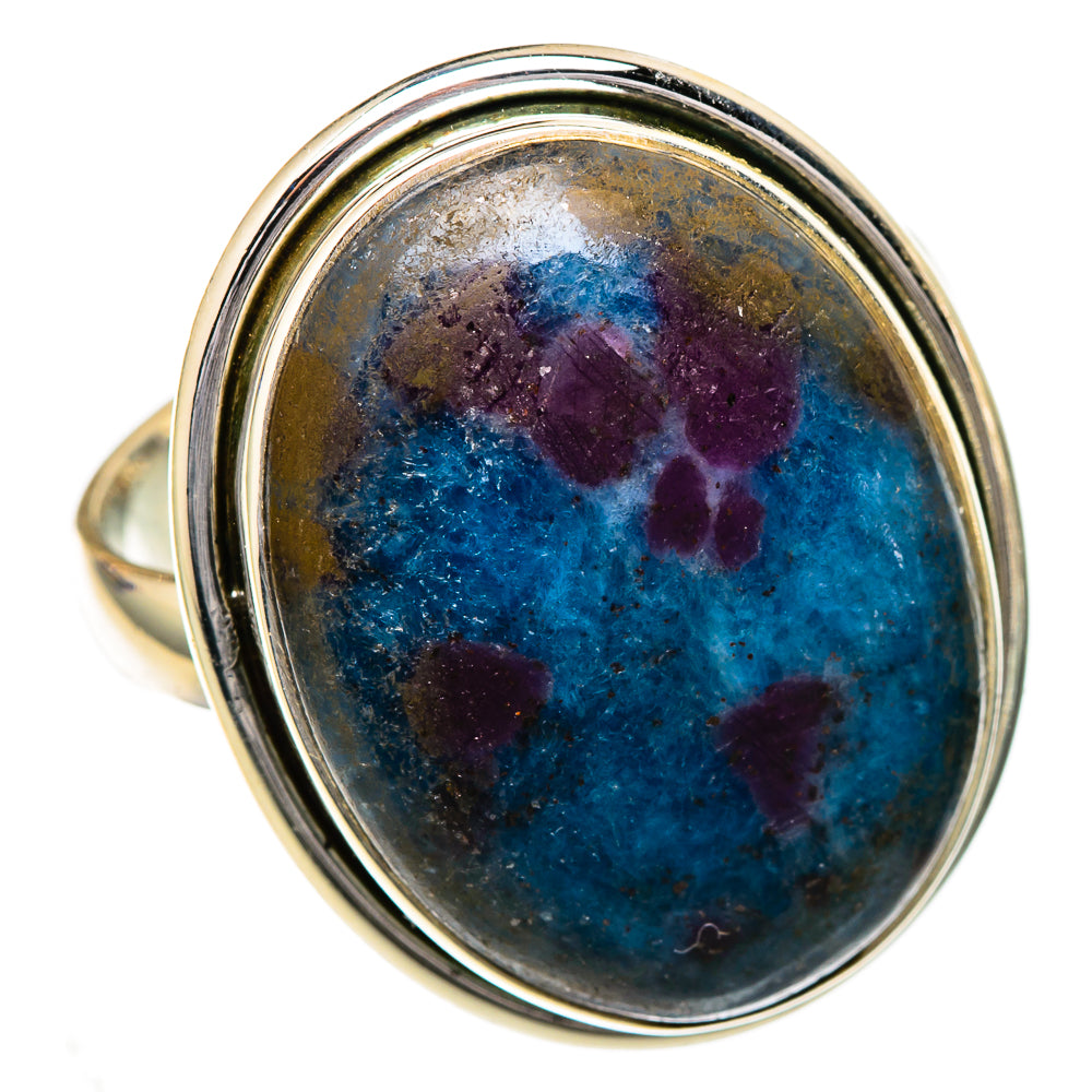 Oval cabochon gemstone ring with blue and purple mottled stone in silver bezel