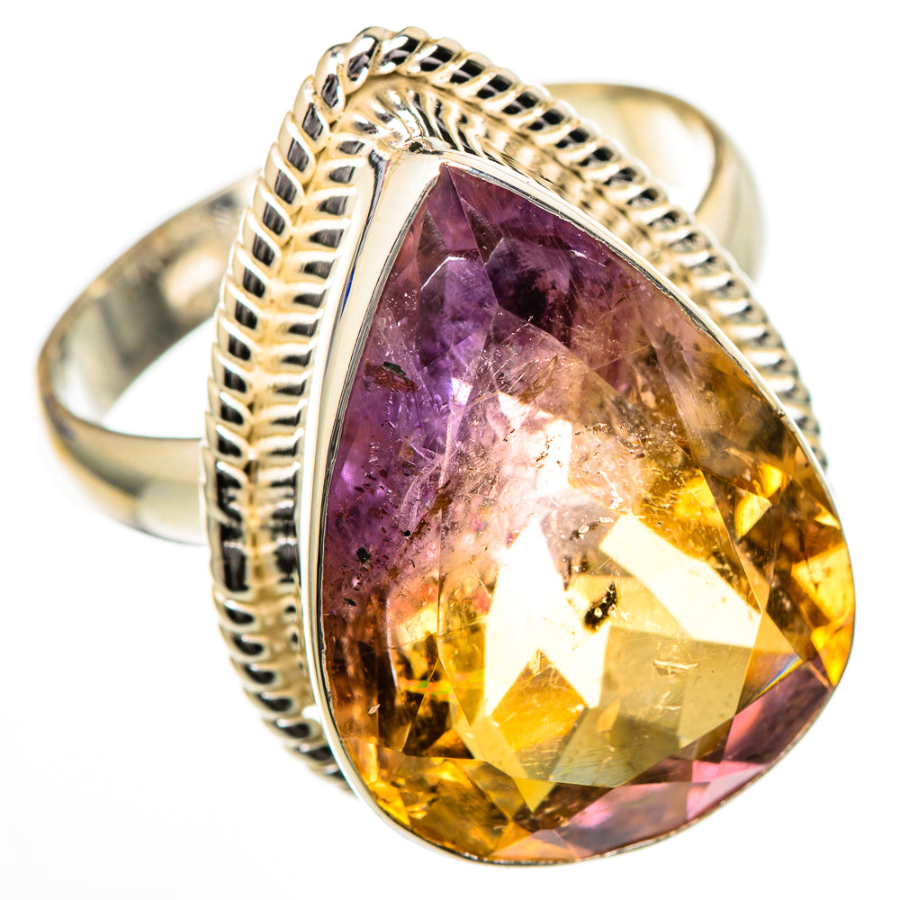 Pear-cut ametrine ring with faceted purple-to-yellow stone, polished metal setting and braided band